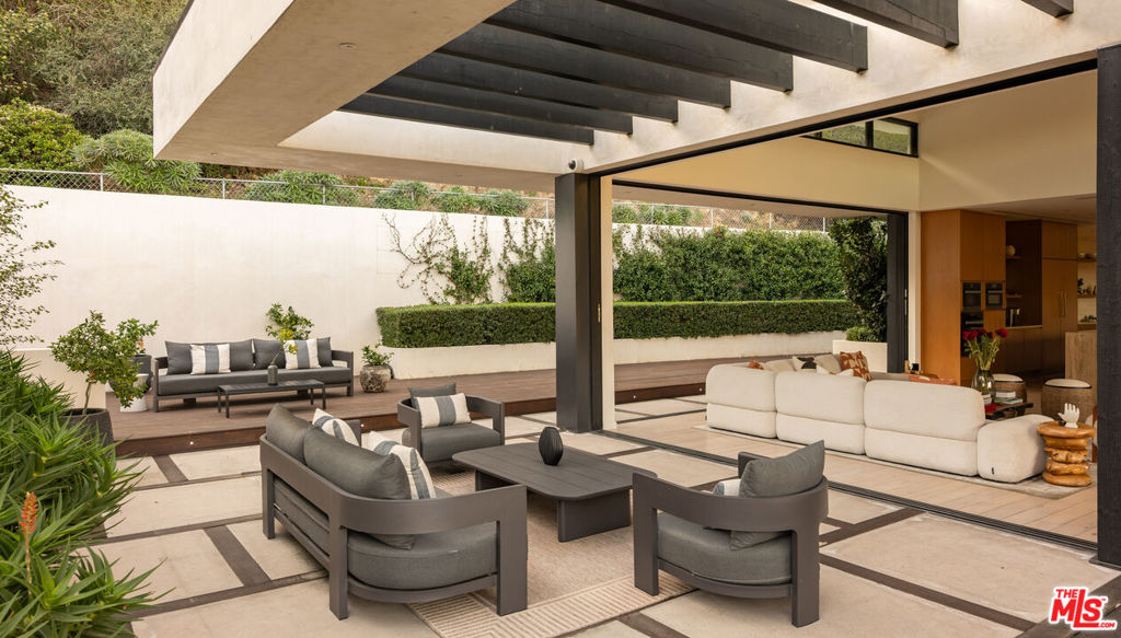 Residential for sale at 7681 Willow Glen Road, Los Angeles CA featuring 5 beds and 7 baths