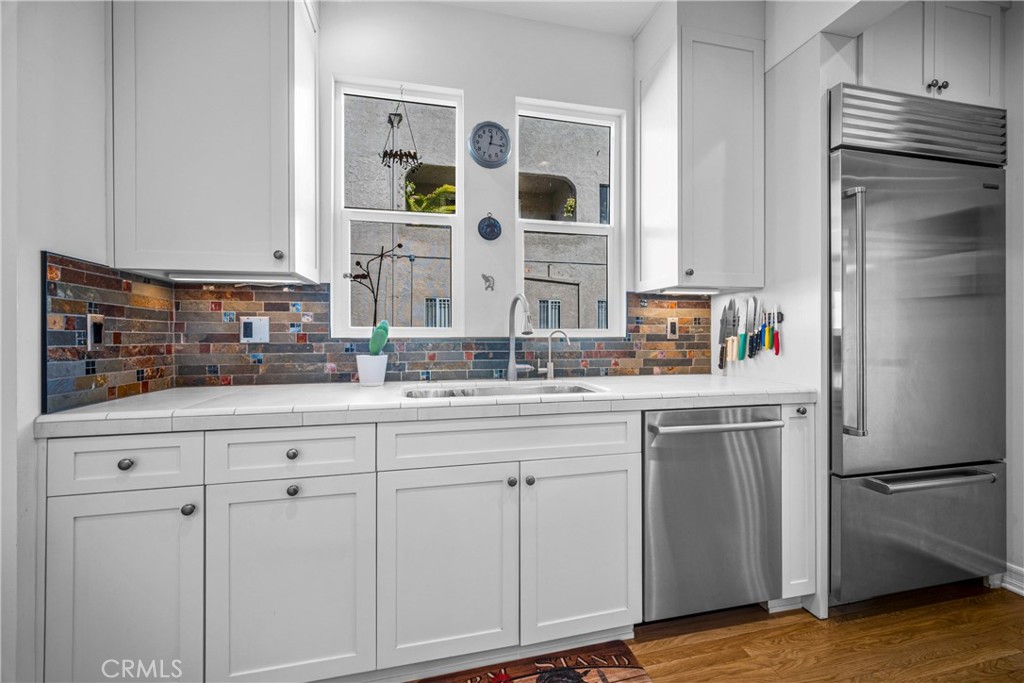 Residential for sale at 1245 S Hudson, Los Angeles CA featuring 6 beds and 4 baths