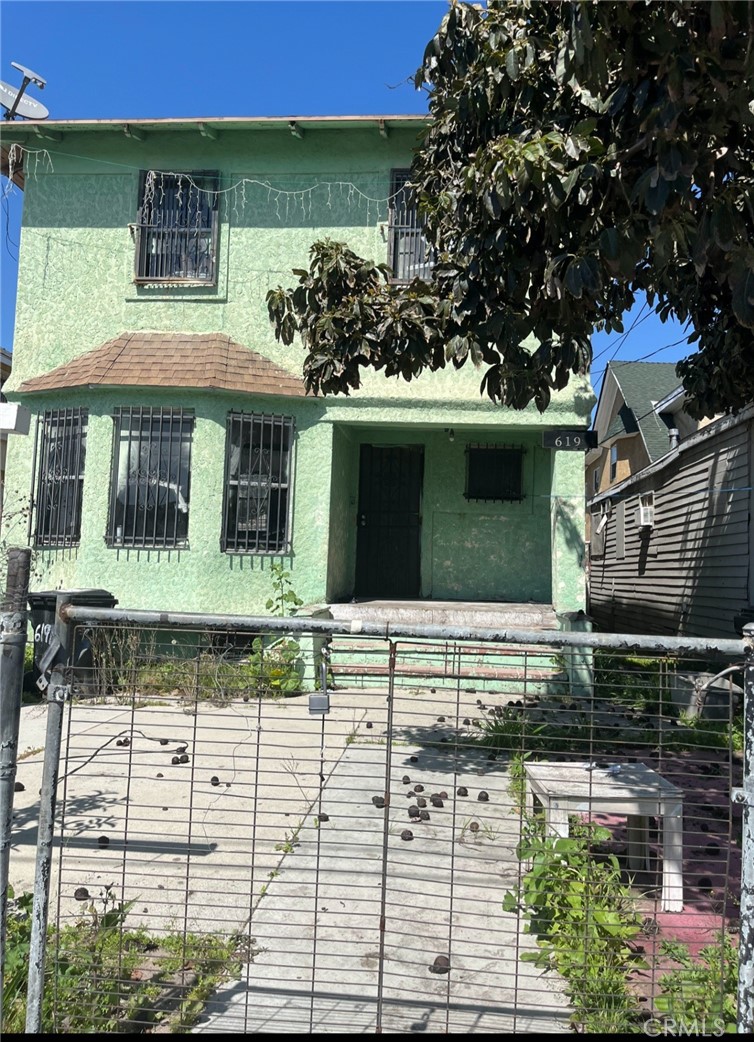 Residential for sale at 619 E 22nd Street, Los Angeles CA featuring 4 beds and 2 baths
