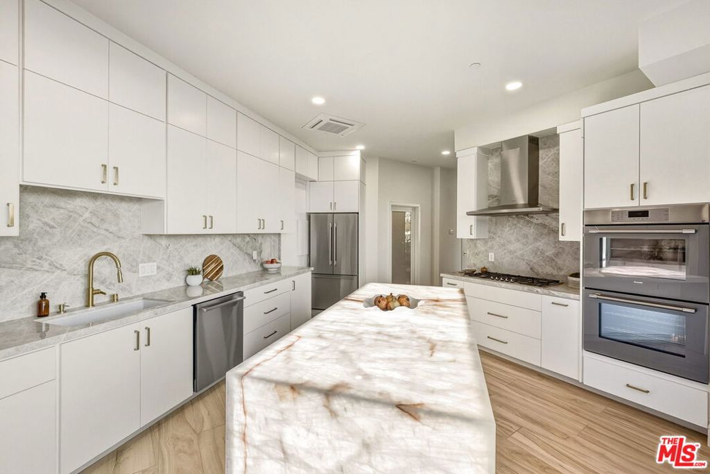 Residential for sale at 8633 Hollywood Boulevard, Los Angeles CA featuring 3 beds and 4 baths