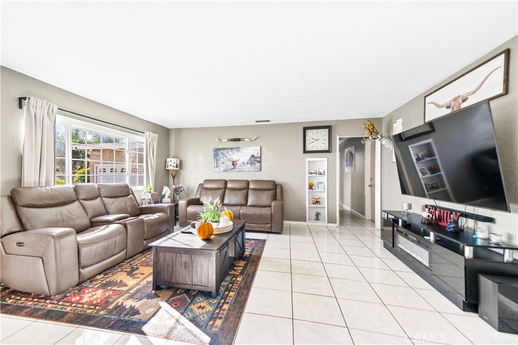 Residential for sale at 152 E Rosewood, Rialto CA featuring 4 beds and 2 baths