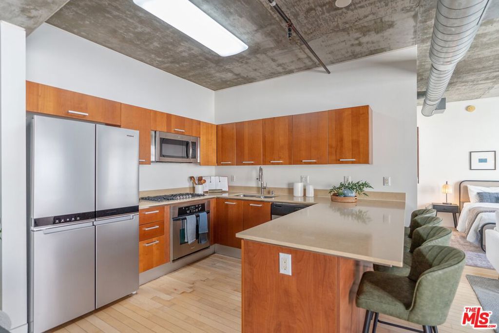 Residential for sale at 645 W 9th Street 618, Los Angeles CA featuring 2 beds and 2 baths
