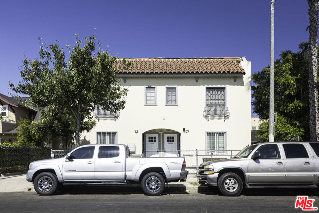 Residential Income for sale at 1561 1/2 S Harvard Boulevard, Los Angeles CA featuring 8 beds and 4 baths