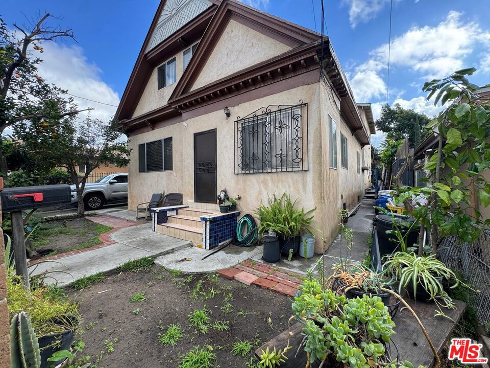 Residential Income for sale at 616 N St Louis Street, Los Angeles CA featuring 7 beds and 4 baths