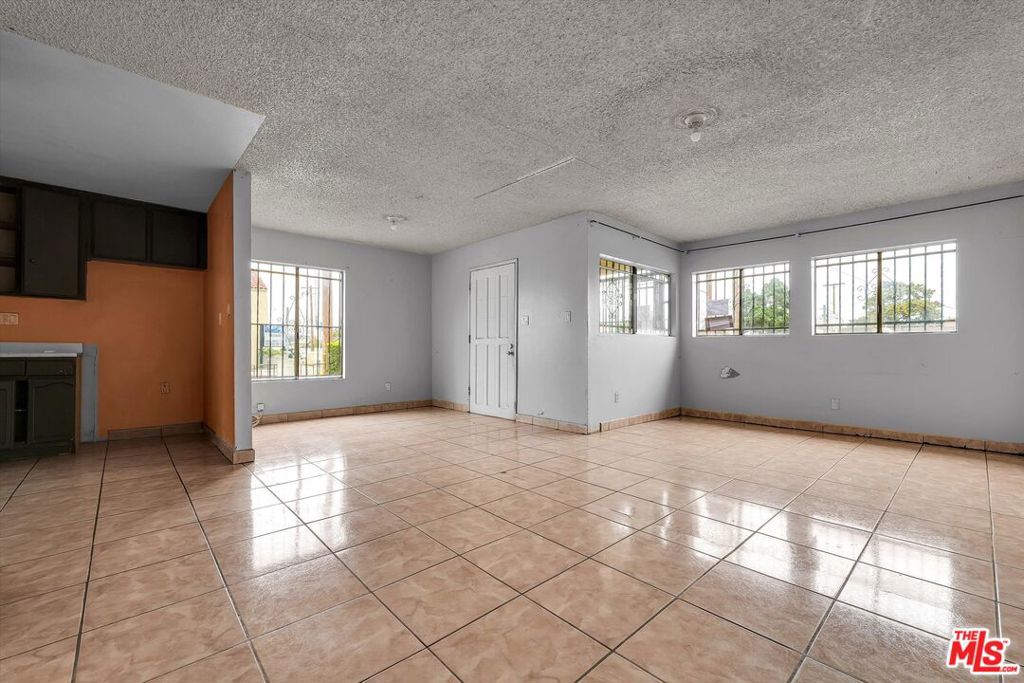 Residential for sale at 1200 W 94th Street, Los Angeles CA featuring 3 beds and 2 baths