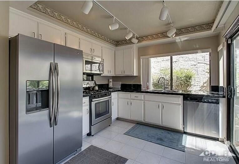 Residential for sale at 2366 E Miramonte Circle E A, Palm Springs CA featuring 2 beds and 2 baths