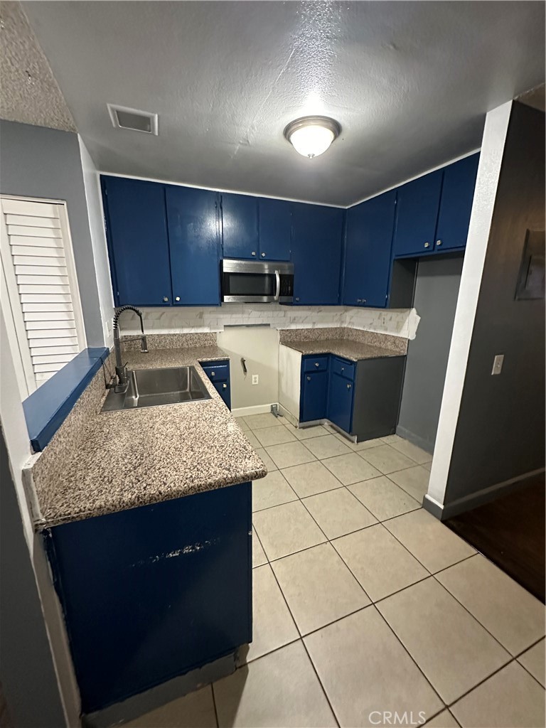 Residential for sale at 165 Racquet Club Drive, Compton CA featuring 3 beds and 3 baths