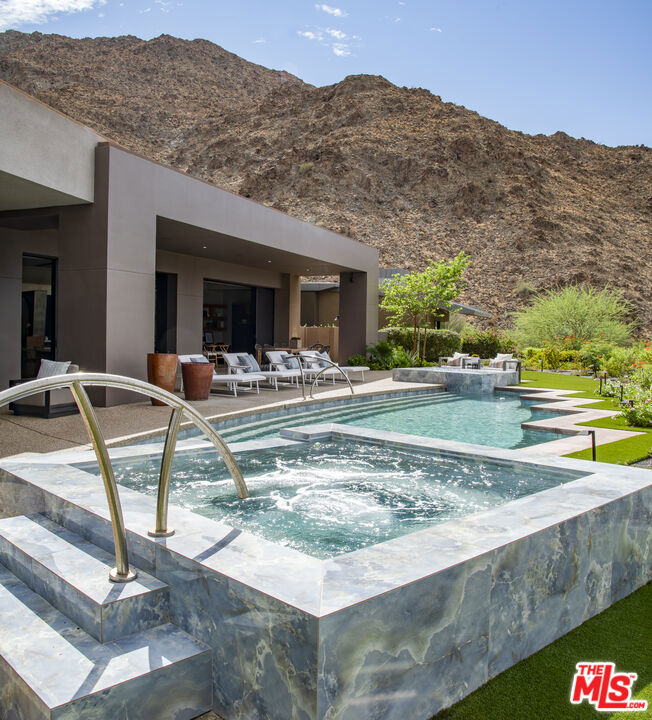 Residential for sale at 49755 Desert Vista Drive, Palm Desert CA featuring 4 beds and 4 baths