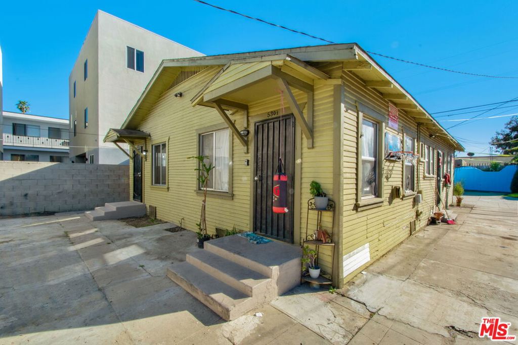 Residential Income for sale at 528 W 75th Street, Los Angeles CA featuring 4 beds and 3 baths