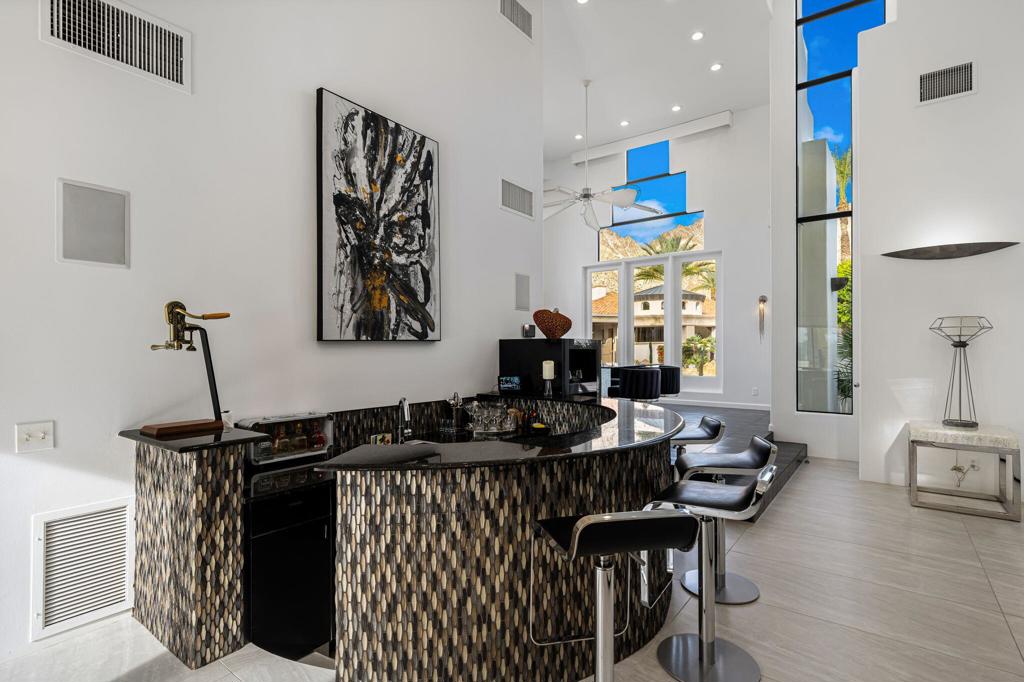 Residential for sale at 49040 Calle Flora, La Quinta CA featuring 4 beds and 6 baths