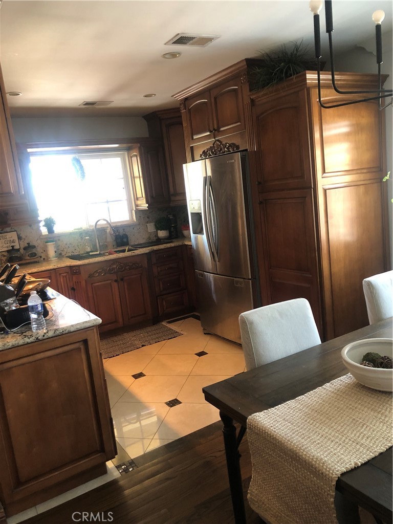 Residential for sale at 11527 Buell Street, Santa Fe Springs CA featuring 4 beds and 2 baths