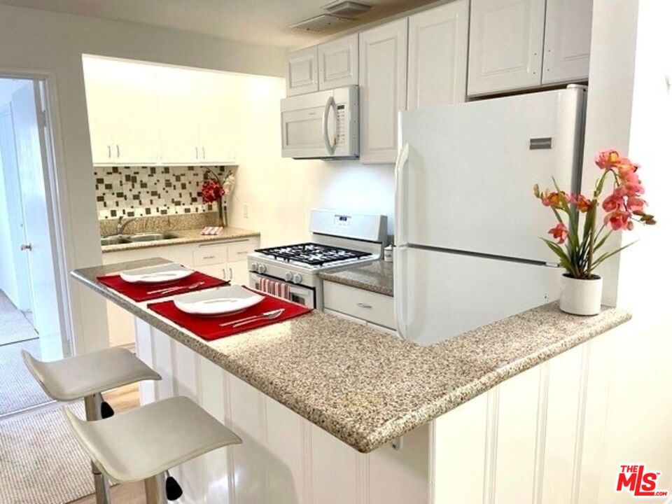 Residential Income for sale at 1453 S Westgate Avenue, Los Angeles CA featuring 9 beds and 9 baths