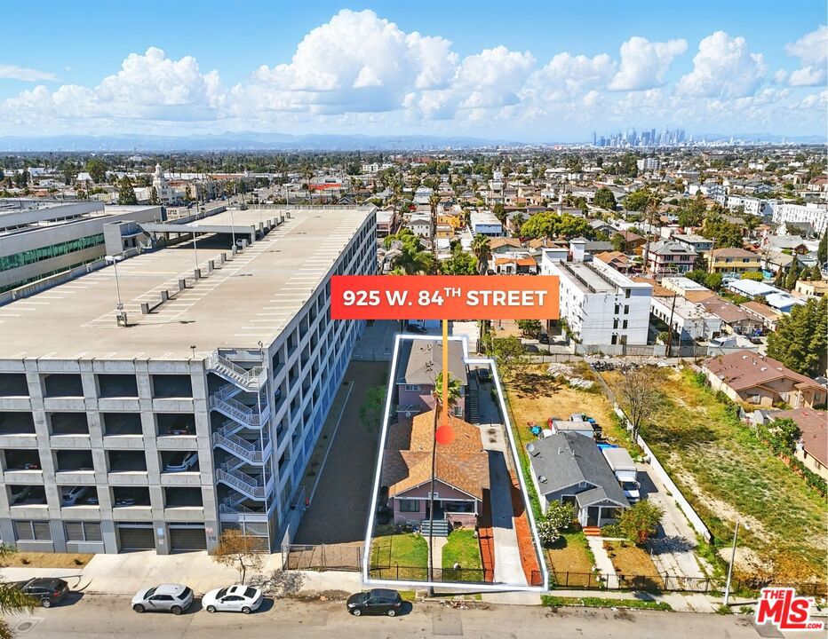 Residential Income for sale at 925 W 84th Street, Los Angeles CA featuring 9 beds and 7 baths