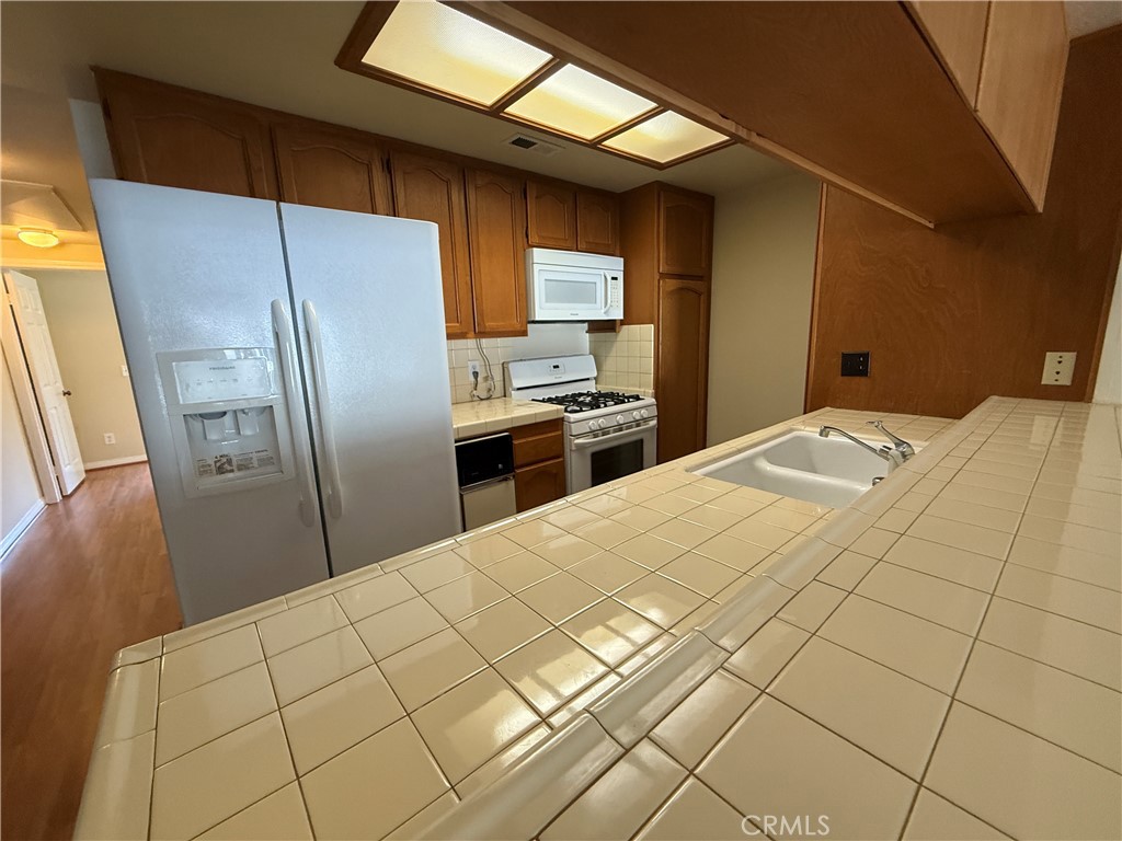 Residential Lease for rent at 11630 Warner 508, Fountain Valley CA featuring 2 beds and 2 baths