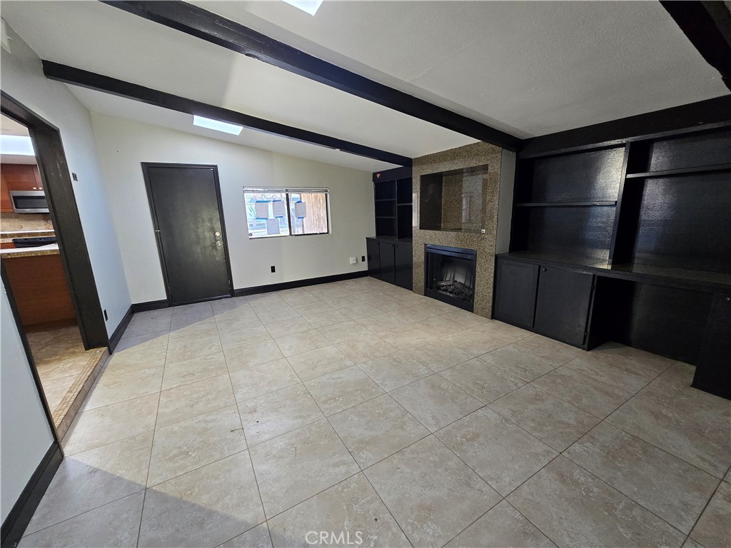 Residential for sale at 6569 N College Avenue, Fresno CA featuring 4 beds and 2 baths