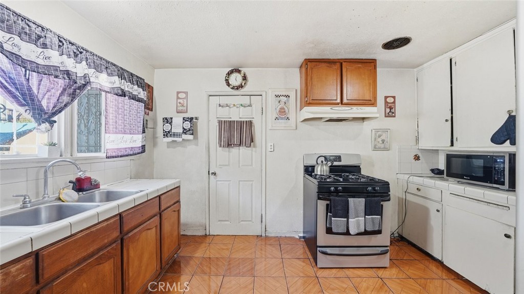 Residential Income for sale at 1523 E Vernon, Los Angeles CA