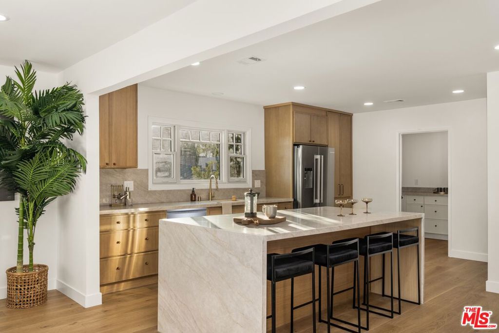 Residential for sale at 6133 Wooster Avenue, Los Angeles CA featuring 5 beds and 3 baths