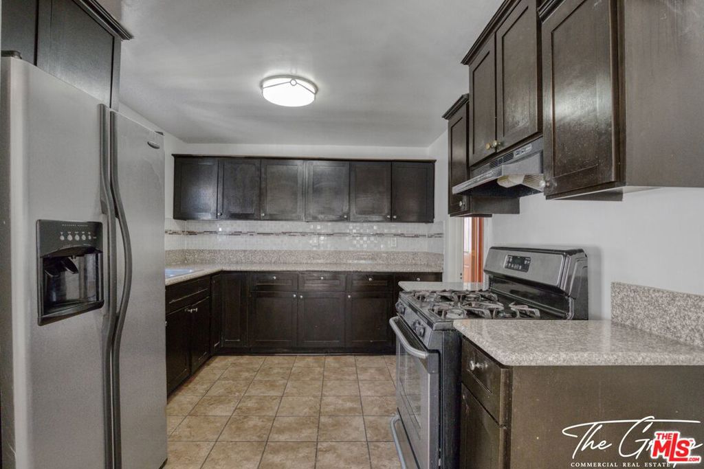 Residential Income for sale at 856 W 47th Street, Los Angeles CA featuring 6 beds and 2 baths