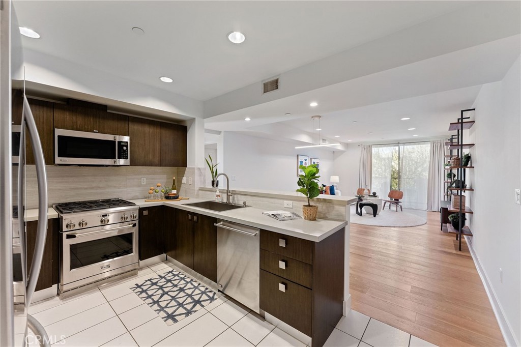 Residential for sale at 118 N Kings Rd 201, Los Angeles CA featuring 3 beds and 3 baths