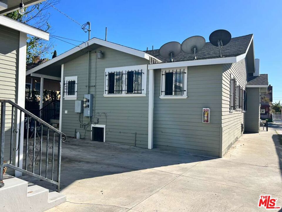 Residential Income for sale at 711 W 41st Street, Los Angeles CA featuring 6 beds and 3 baths