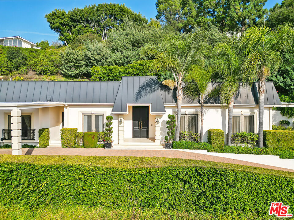 Residential for sale at 10825 Chalon Road, Los Angeles CA featuring 4 beds and 6 baths