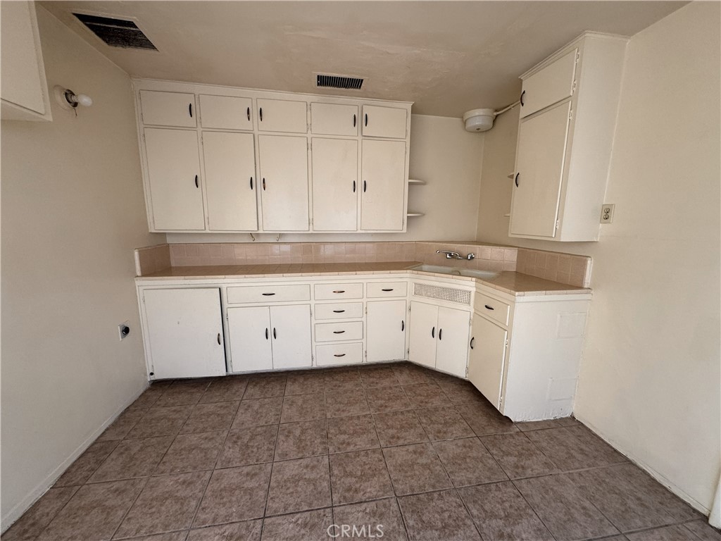 Residential for sale at 521 E Williams Street, Barstow CA featuring 4 beds and 3 baths