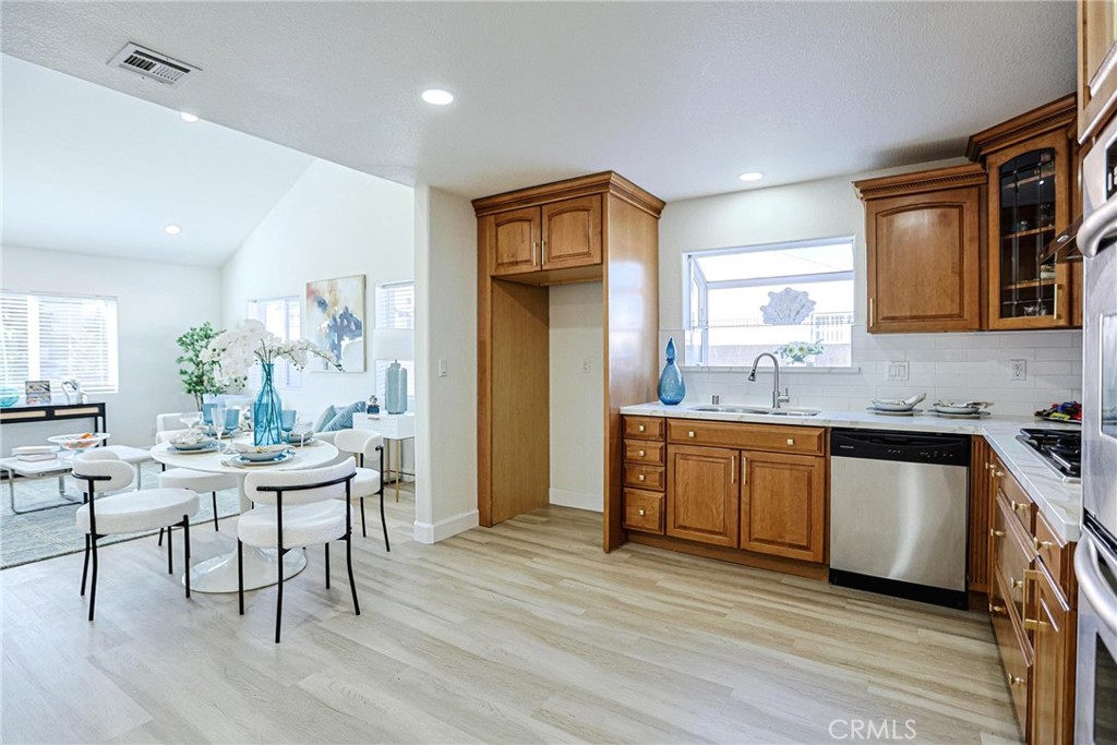 Residential for sale at 13102 13104 Monroe, Garden Grove CA featuring 8 beds and 7 baths