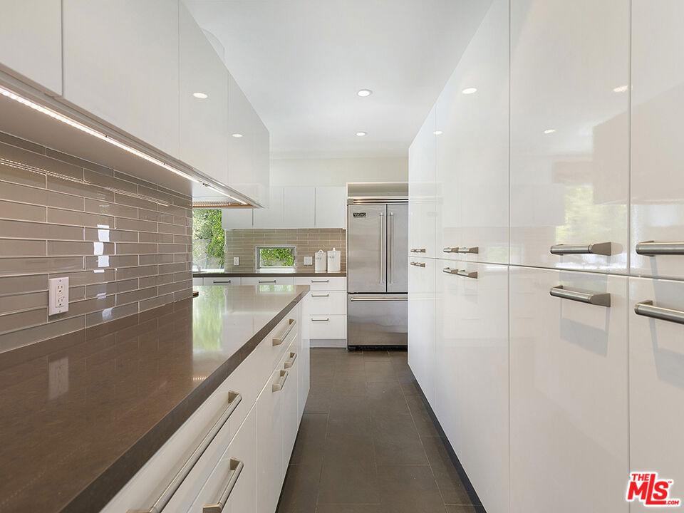 Residential for sale at 15514 Casiano Court, Los Angeles CA featuring 5 beds and 5 baths