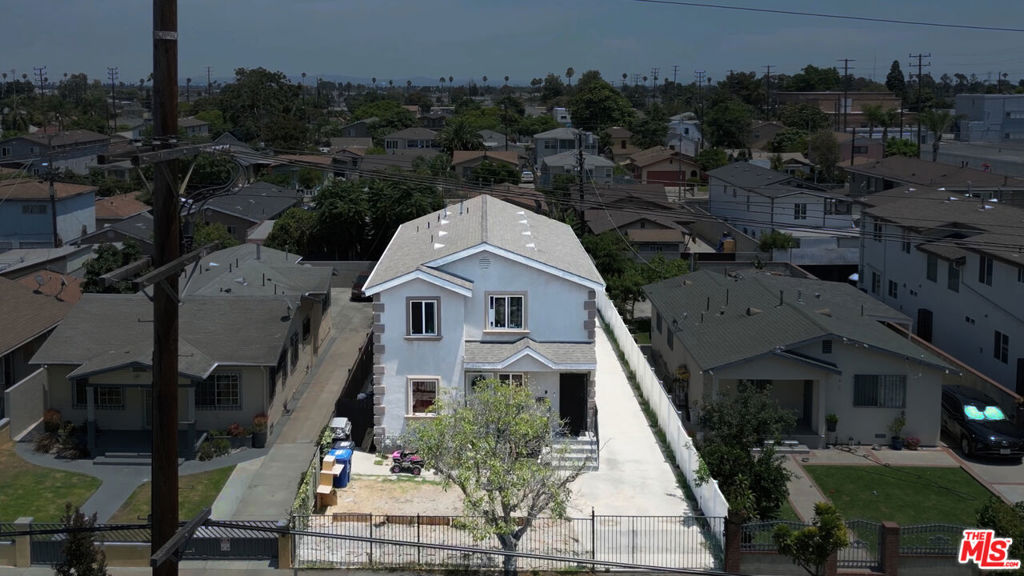 Residential Income for sale at 9128 Menlo Avenue, Los Angeles CA featuring 8 beds and 4 baths
