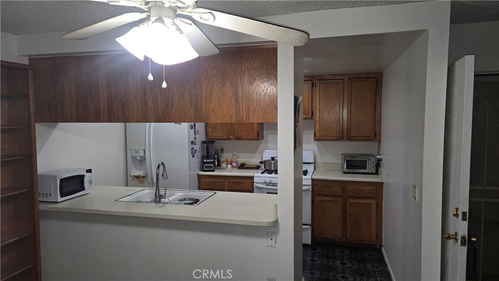Residential for sale at 12427 Rock Springs Court, Garden Grove CA featuring 2 beds and 2 baths