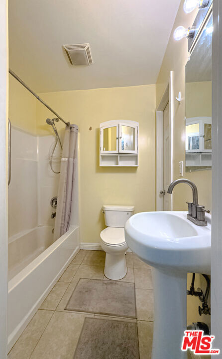 Residential Income for sale at 1409 S New Hampshire Avenue, Los Angeles CA featuring 4 beds and 3 baths