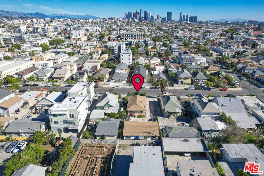 Residential Income for sale at 1139 S Kingsley Drive, Los Angeles CA featuring 4 beds and 3 baths