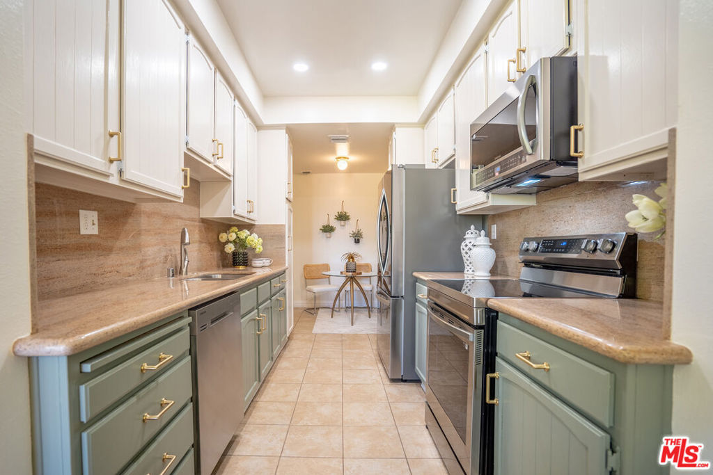 Residential for sale at 4477 Wilshire Boulevard 312, Los Angeles CA featuring 2 beds and 2 baths