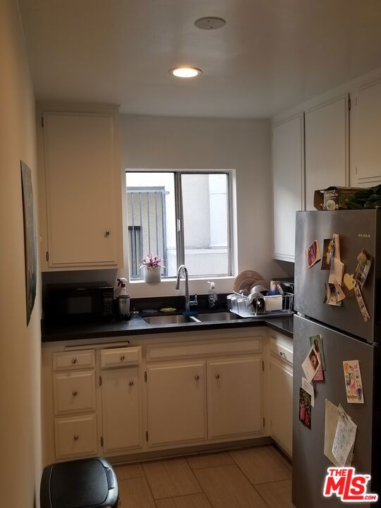 Residential Income for sale at 453 S Gramercy Place, Los Angeles CA featuring 8 beds and 14 baths