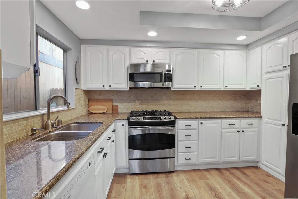 Residential for sale at 16611 Sell 24, Huntington Beach CA featuring 2 beds and 3 baths