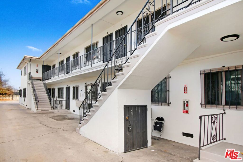 Residential Income for sale at 811 W 97th Street, Los Angeles CA featuring 14 beds and 10 baths