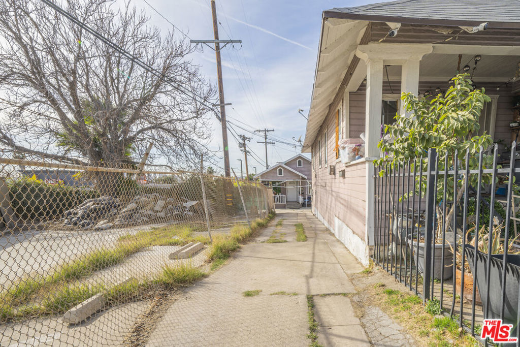 Residential Income for sale at 2415 N Gates Street, Los Angeles CA featuring 5 beds and 3 baths