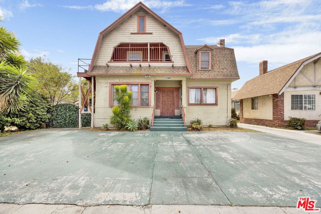 Residential Income for sale at 1166 W 39th Place, Los Angeles CA featuring 7 beds and 3 baths