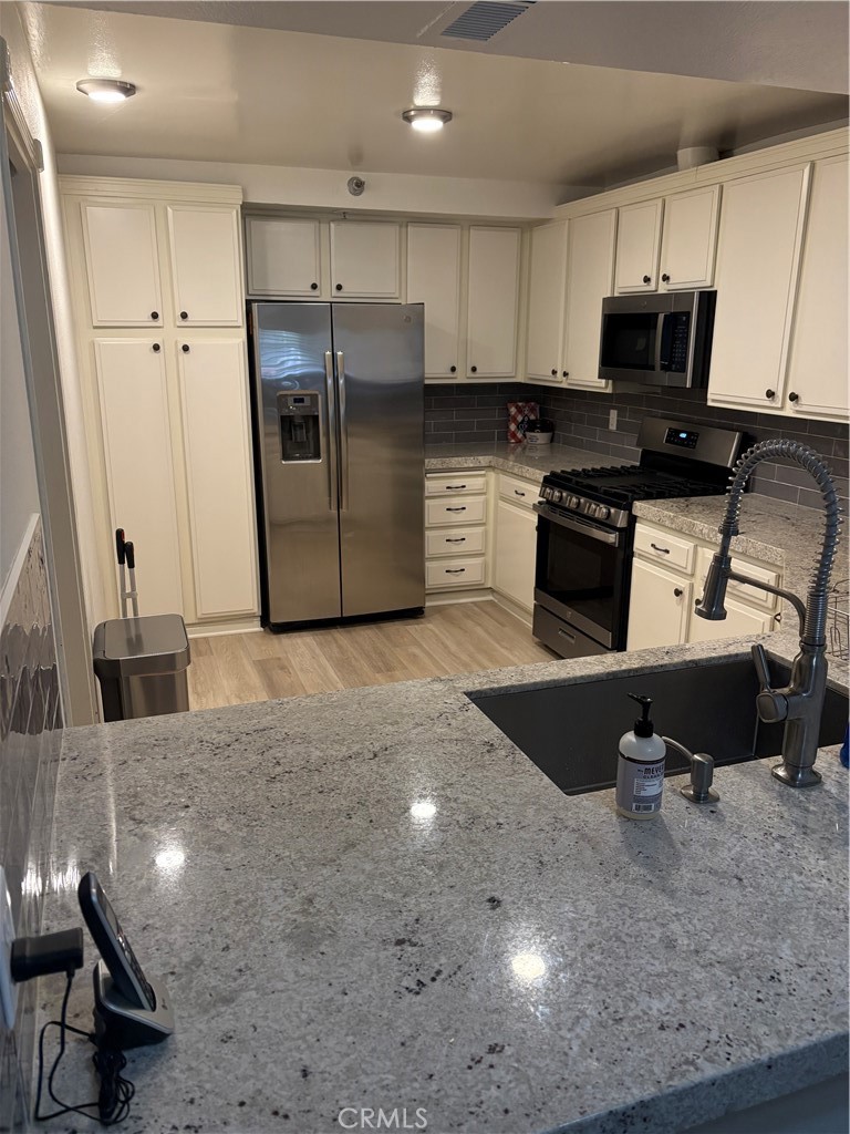 Residential Lease for rent at 240 Nice Lane 101, Newport Beach CA featuring 2 beds and 2 baths