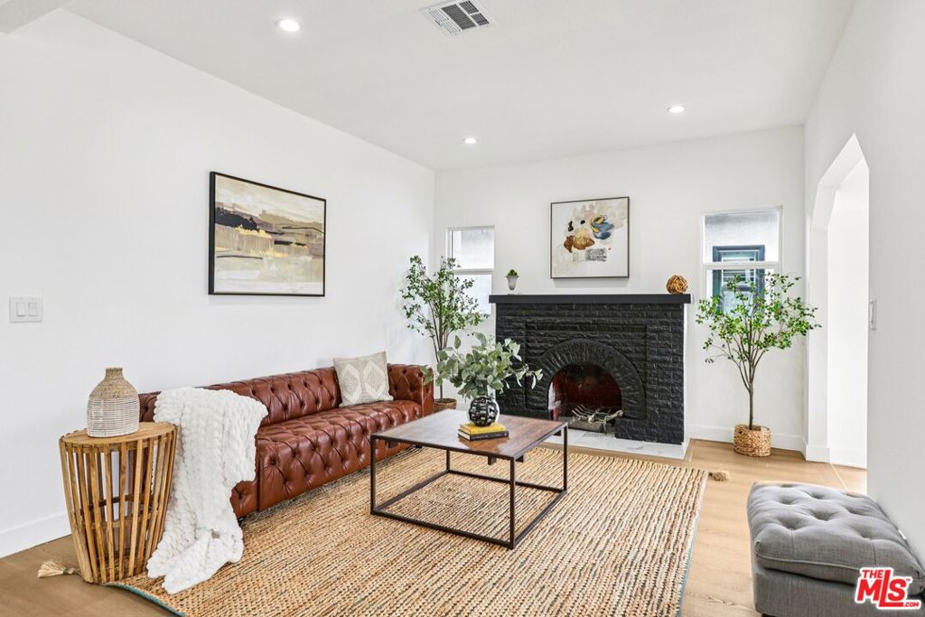 Residential for sale at 1320 W 51st Place, Los Angeles CA featuring 5 beds and 4 baths