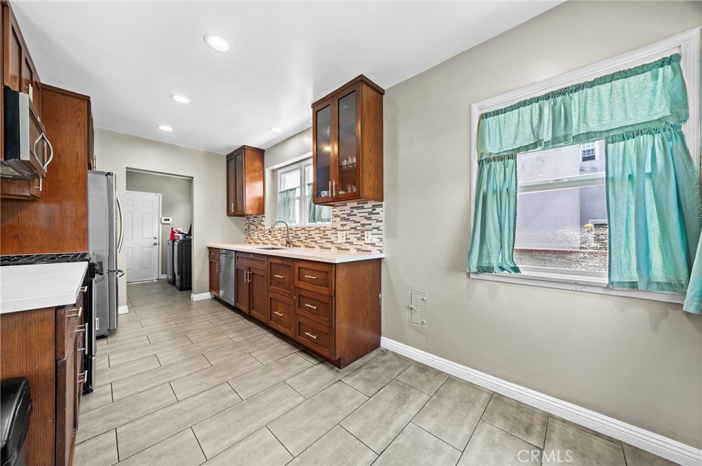 Residential for sale at 9406 S Harvard Boulevard, Los Angeles CA featuring 4 beds and 2 baths