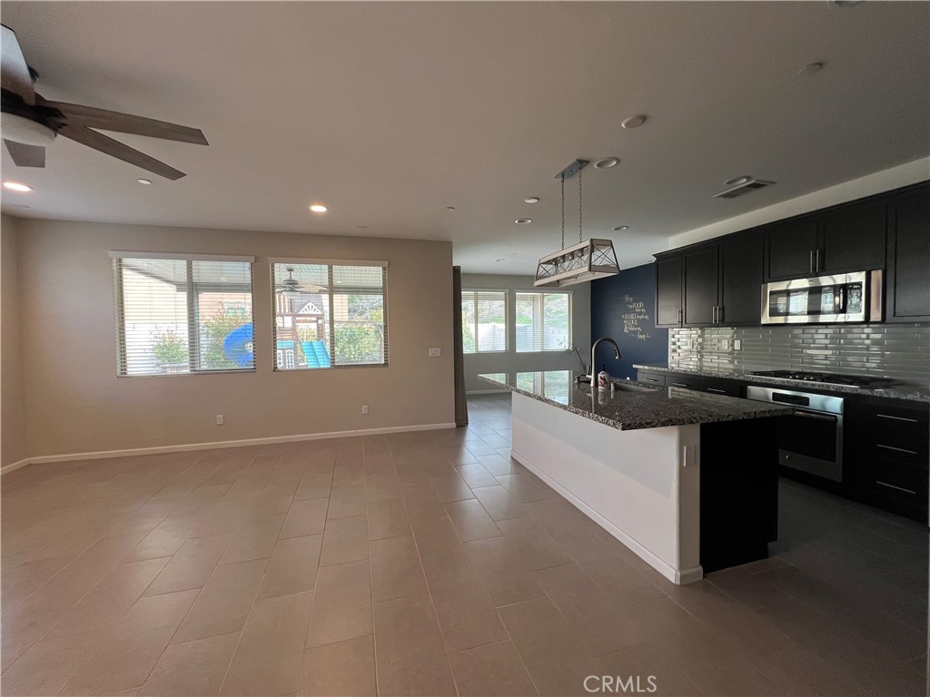 Residential for sale at 24464 Periwinkle, Lake Elsinore CA featuring 5 beds and 3 baths