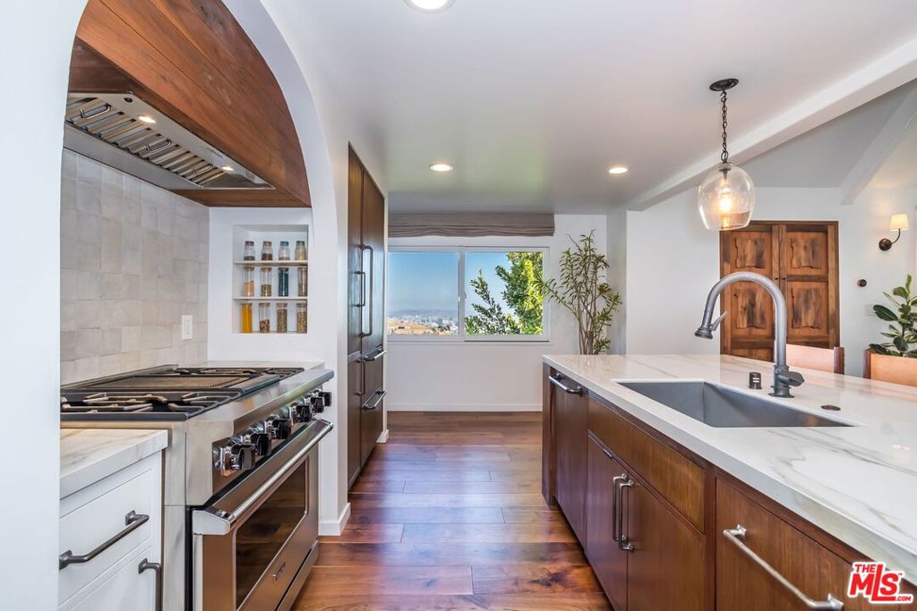 Residential for sale at 8148 Mannix Drive, Los Angeles CA featuring 3 beds and 3 baths