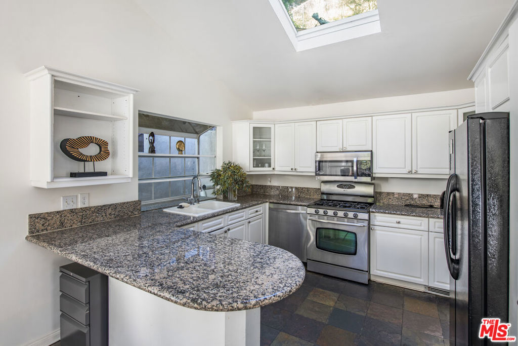Residential for sale at 8032 Willow Glen Road, Los Angeles CA featuring 4 beds and 3 baths