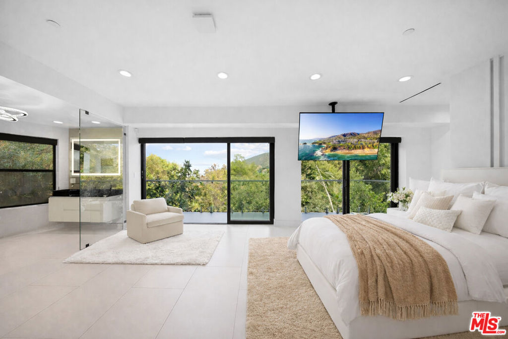 Residential for sale at 7141 Woodrow Wilson Drive, Los Angeles CA featuring 3 beds and 4 baths