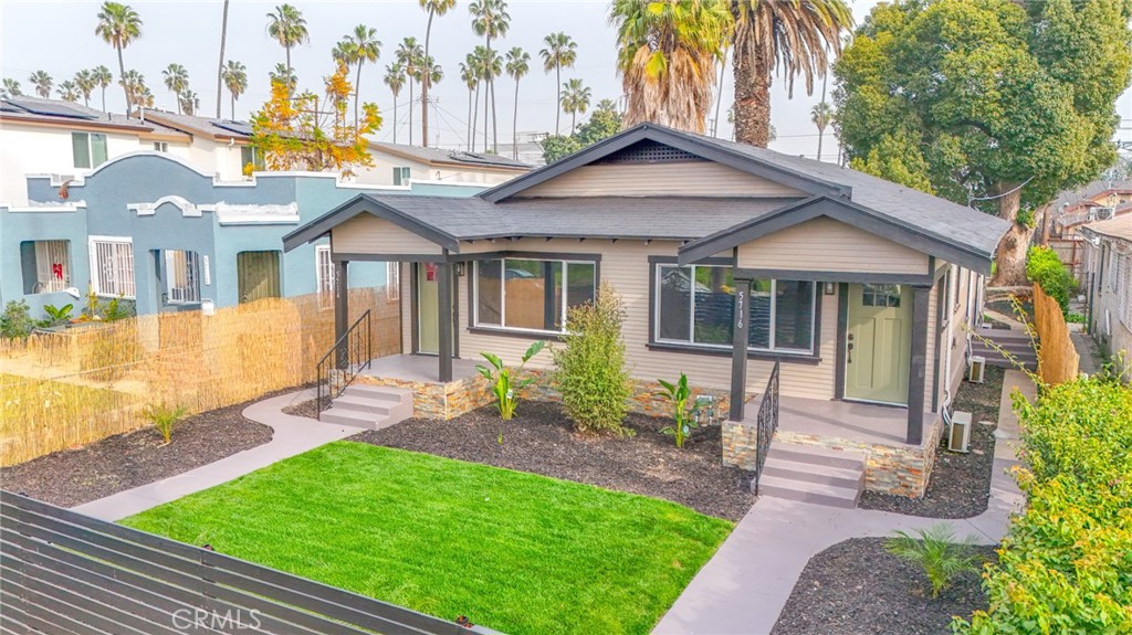 Residential Income for sale at 5714 S St Andrews, Los Angeles CA