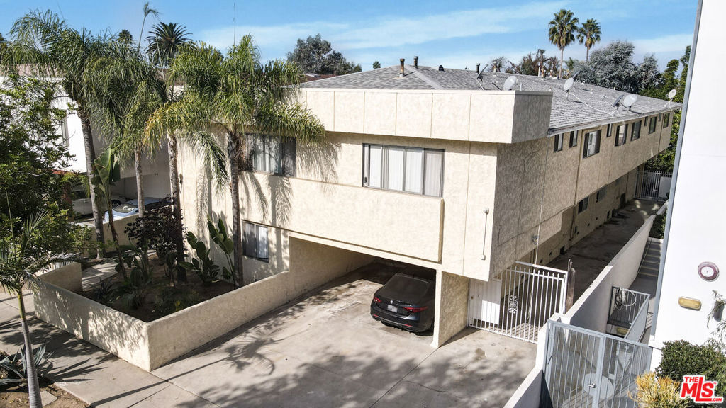 Residential Income for sale at 1133 S Spaulding Avenue 4, Los Angeles CA