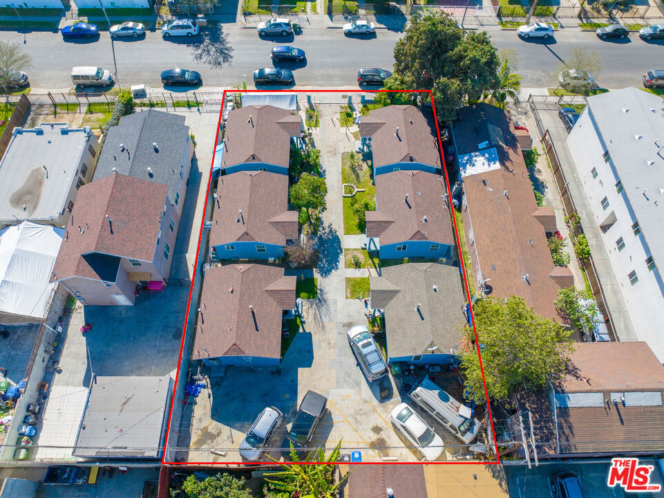 Residential Income for sale at 359 E 56th Street, Los Angeles CA featuring 6 beds and 6 baths