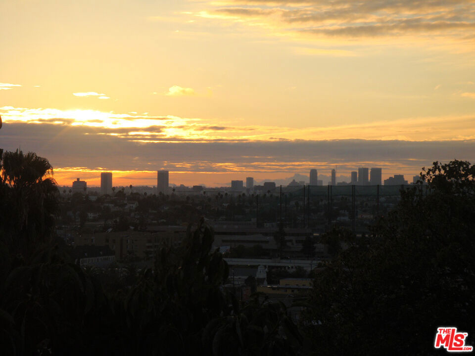 Residential Income for sale at 975 Lucile Avenue, Los Angeles CA featuring 4 beds and 4 baths