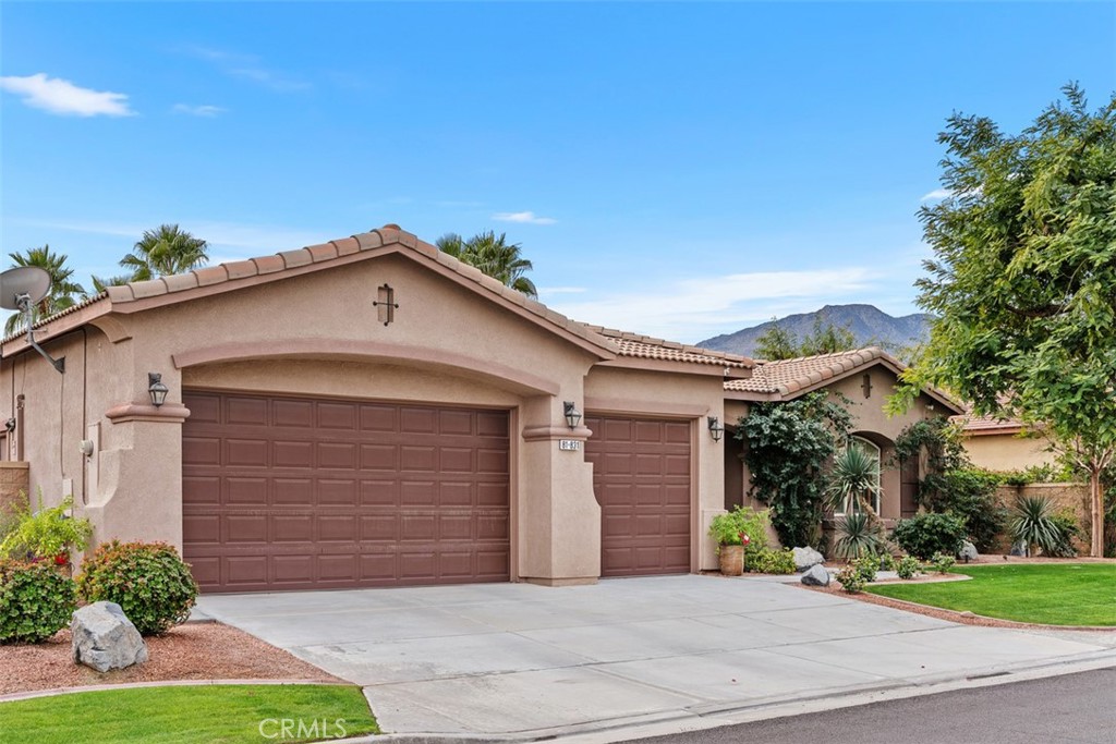 Residential for sale at 81831 Fiori Del Deserto Drive, La Quinta CA featuring 4 beds and 3 baths